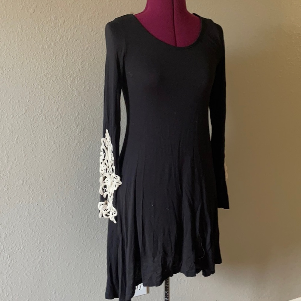 Black knit dress with lace crochet sleeves